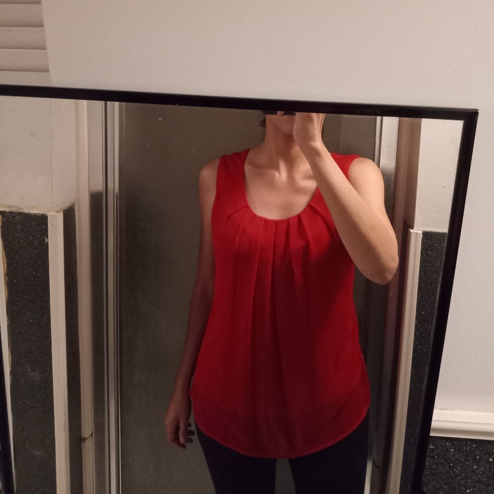 Women's orange sleeveless blouse Size M